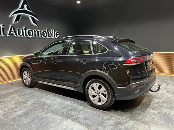 Volkswagen Taigo (2022) — foto 8 van 19