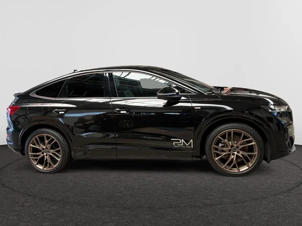 AUDI Q4 Sportback e-tron (2024) — foto 17 van 22